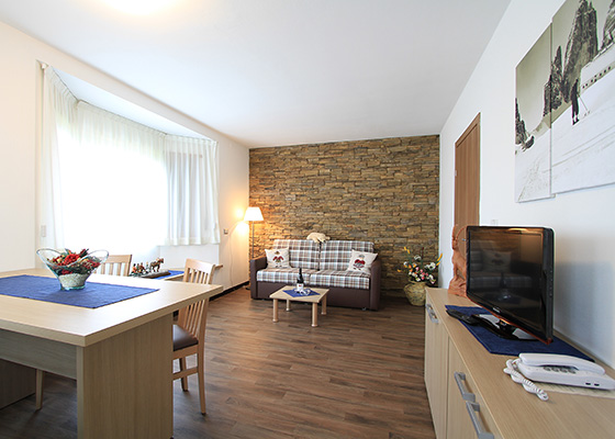 Wohnzimmer - Ferienwohnungen Ariola in Wolkenstein in Gröden